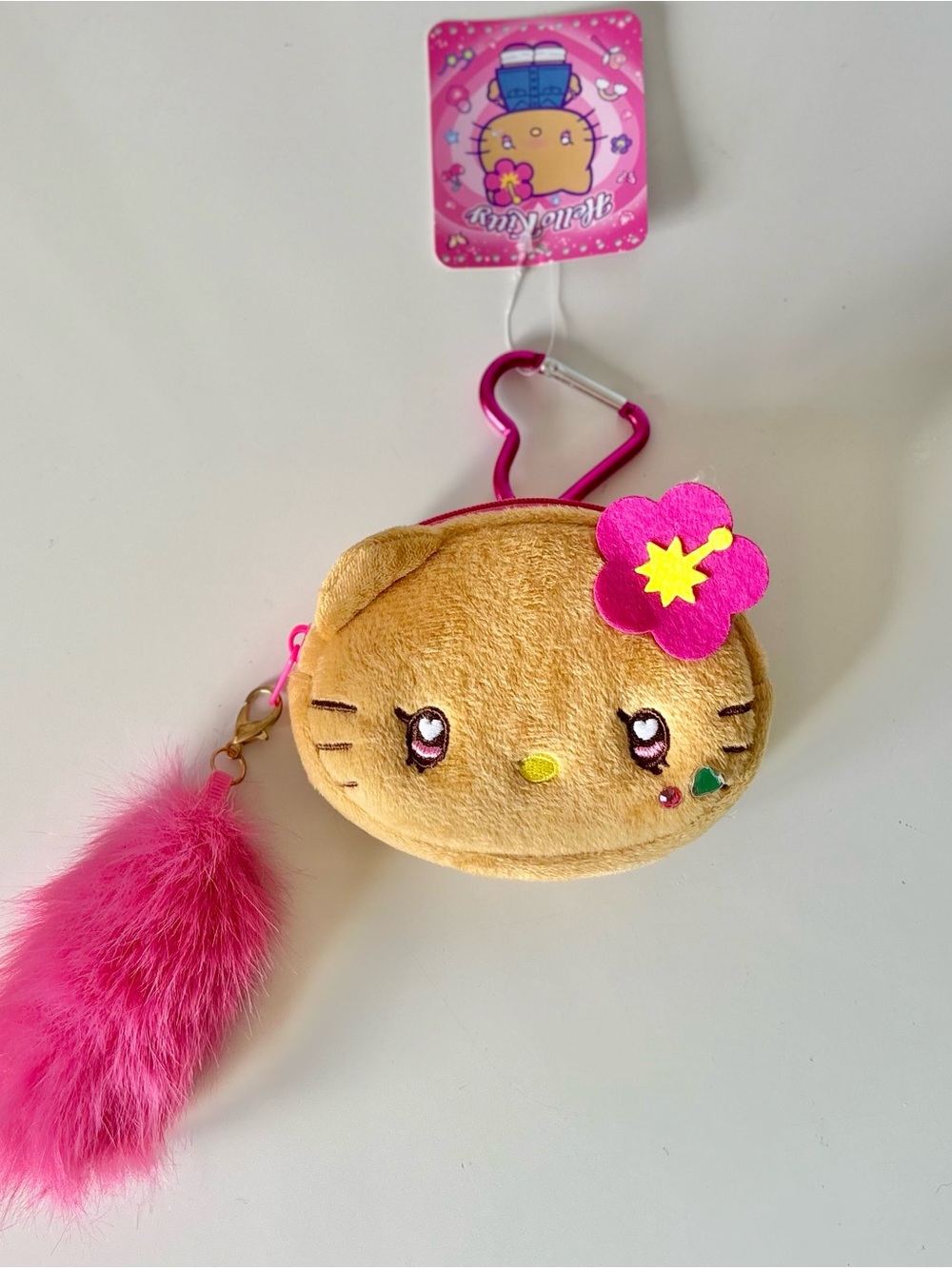 Hello Kitty Suntanned Series Pouch Keychain w Hibiscus Bow and Fluffy Tail NWT